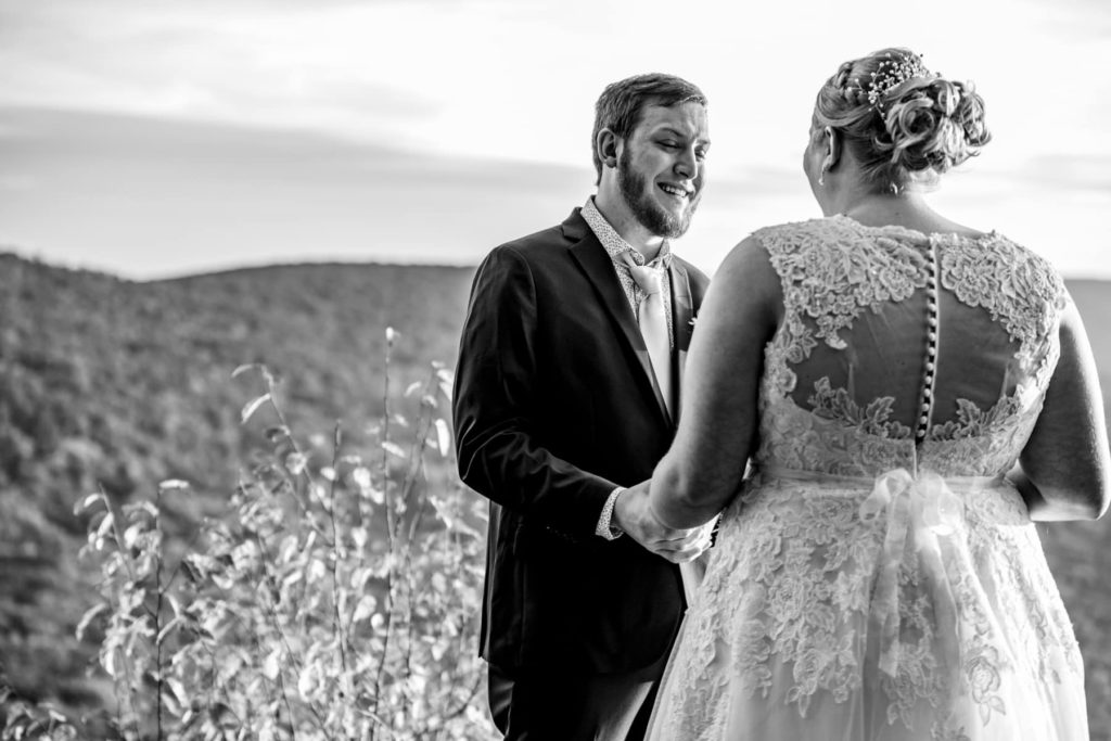The groom cries seeing his bride for the first time during this Pennsylvania destination elopement sunrise first look.