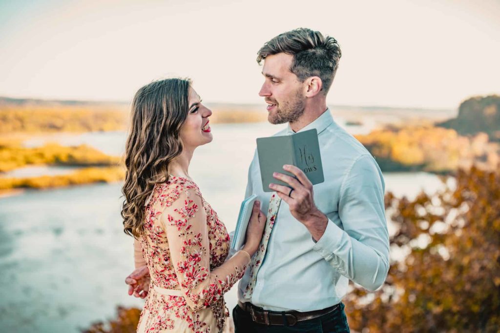 Reading their vows atop a Wisconsin cliff, this couple renews their vows in elopement style