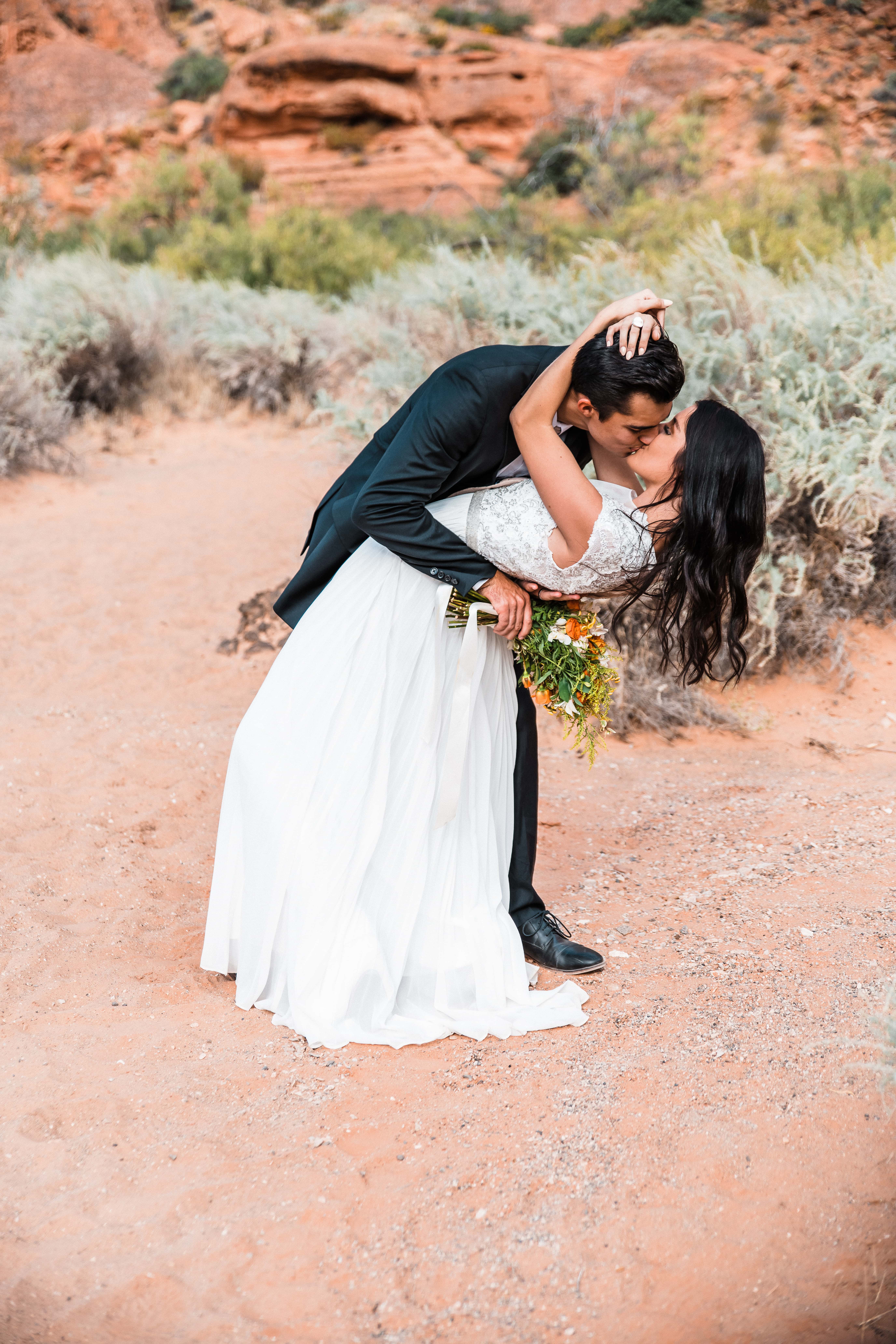 A first kiss after being married in southern Utah
